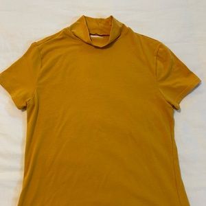 Yellow turtle neck blouse. In perfect condition